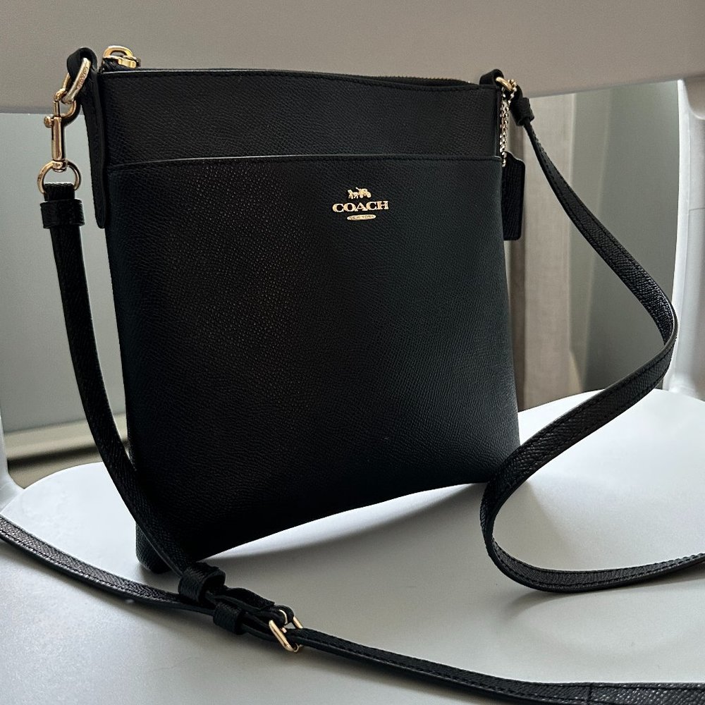 Black leather Coach crossbody bag